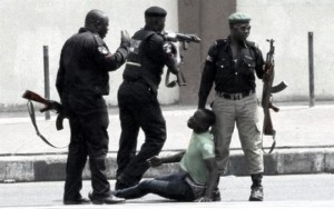 protest_pictures_Ademola_Aderinde_being_molested_150851430